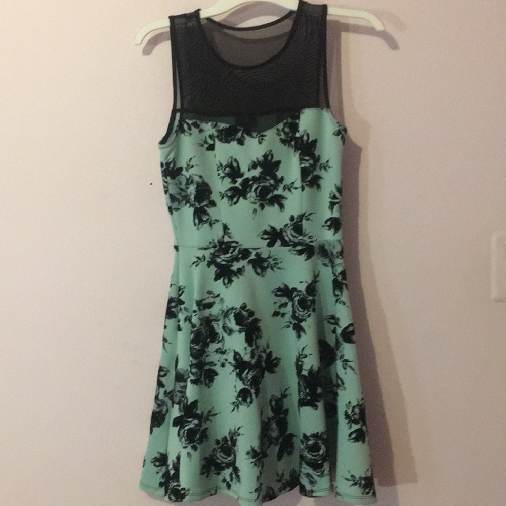 Teal dress with black velvet flowers
